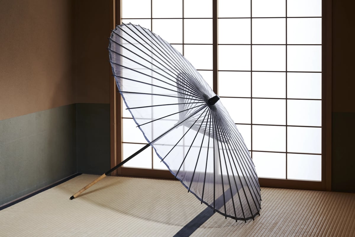 A paper umbrella standing in the practice studio
