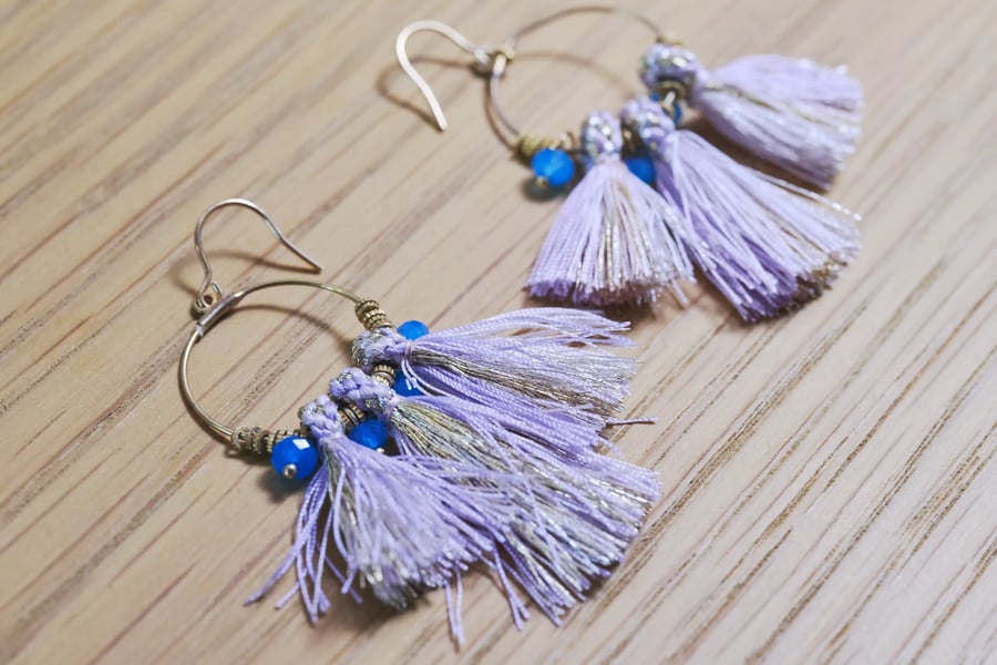 Braided cord finished with tassels