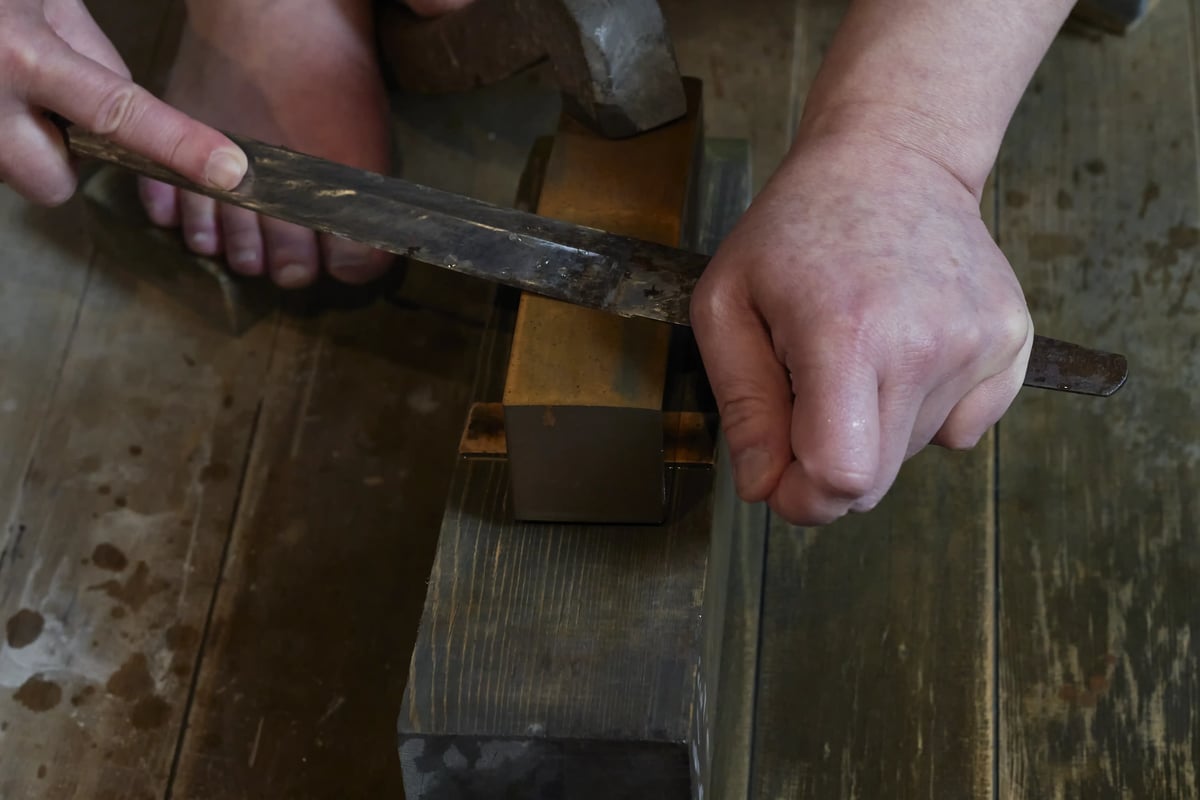 A finger stone worked along the blade