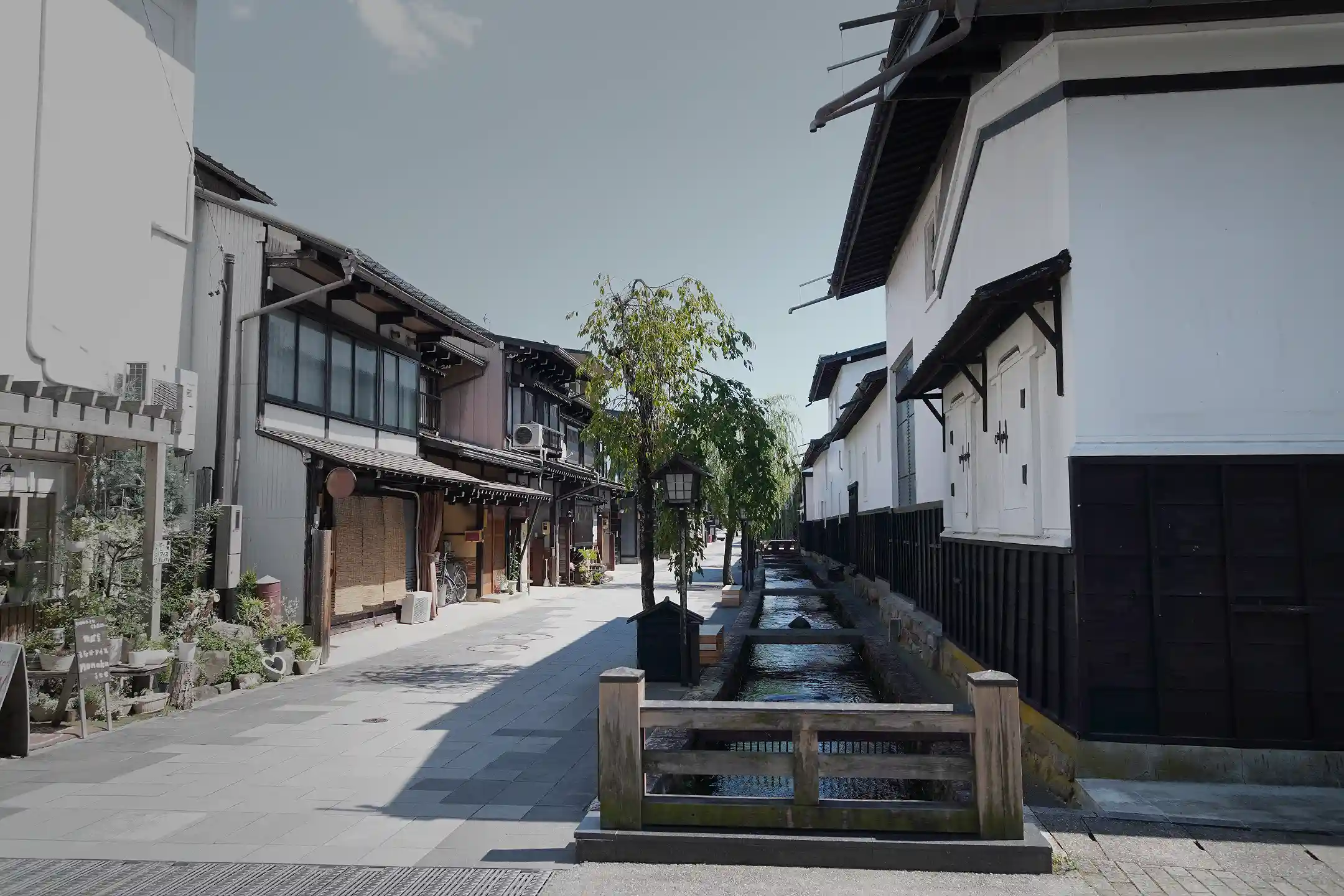 White-walled storehouses along a canal