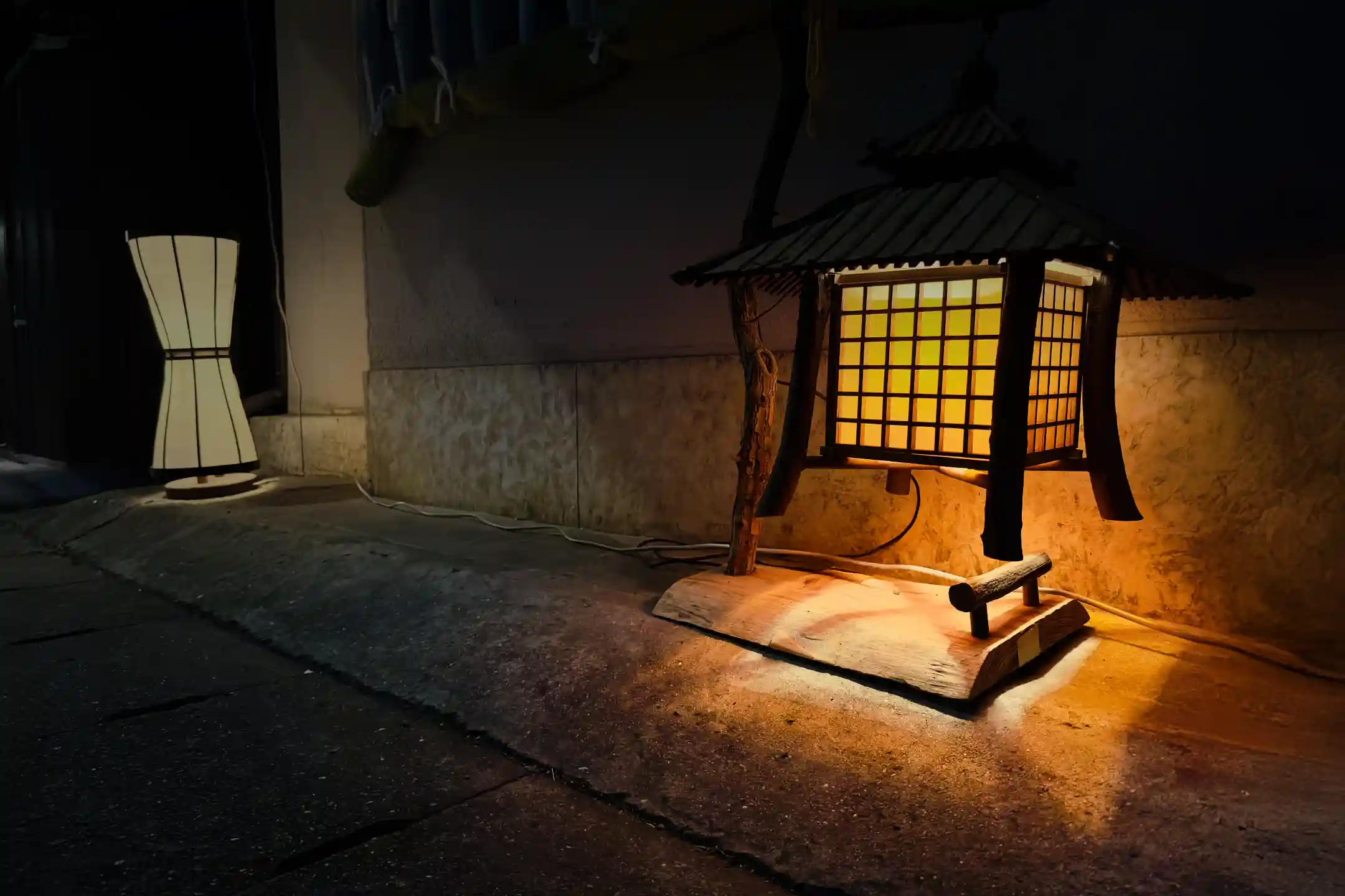 A lantern-lit back alley in Kyoto at night
