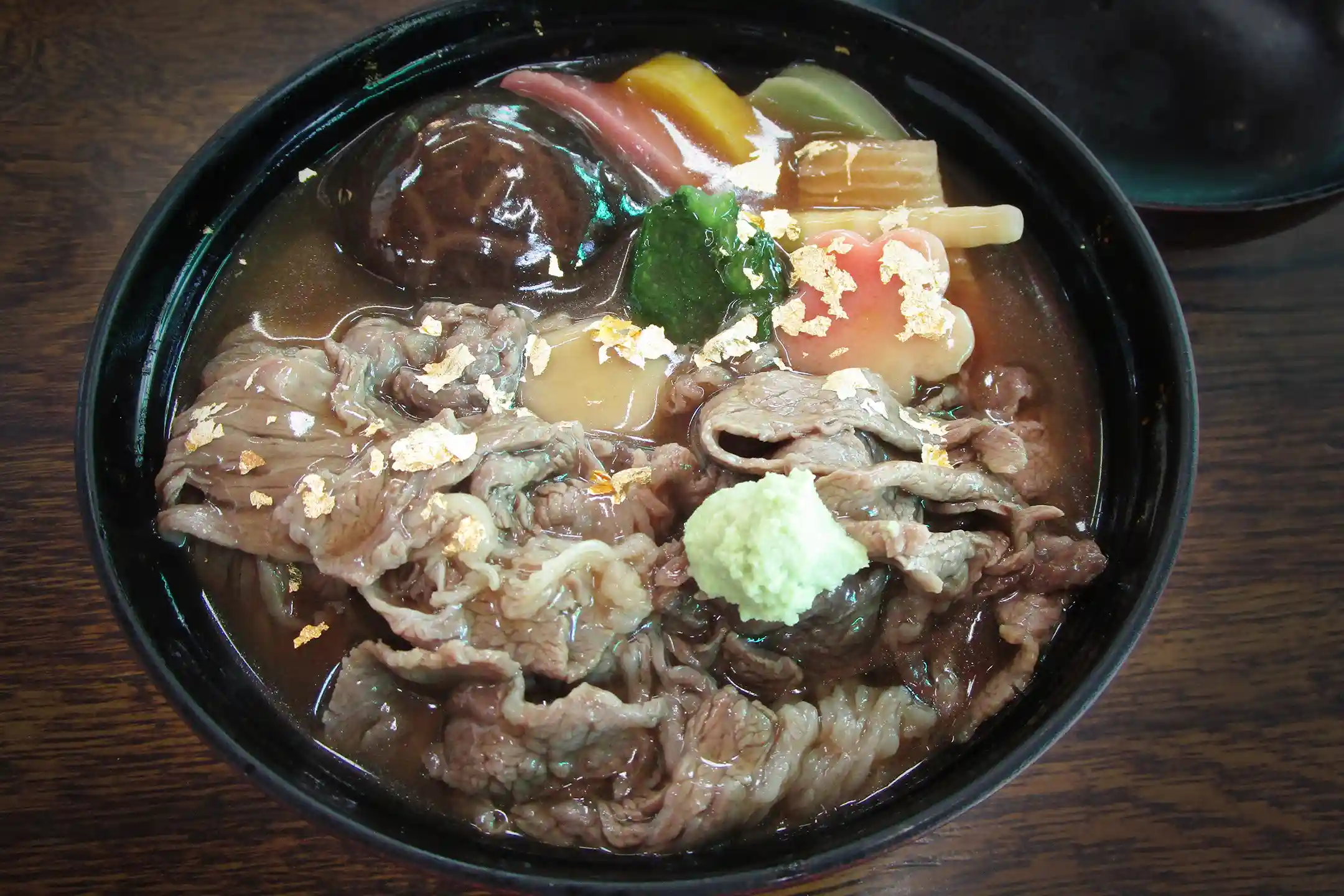 Jibuni, a traditional Kanazawa stew, finished with gold leaf