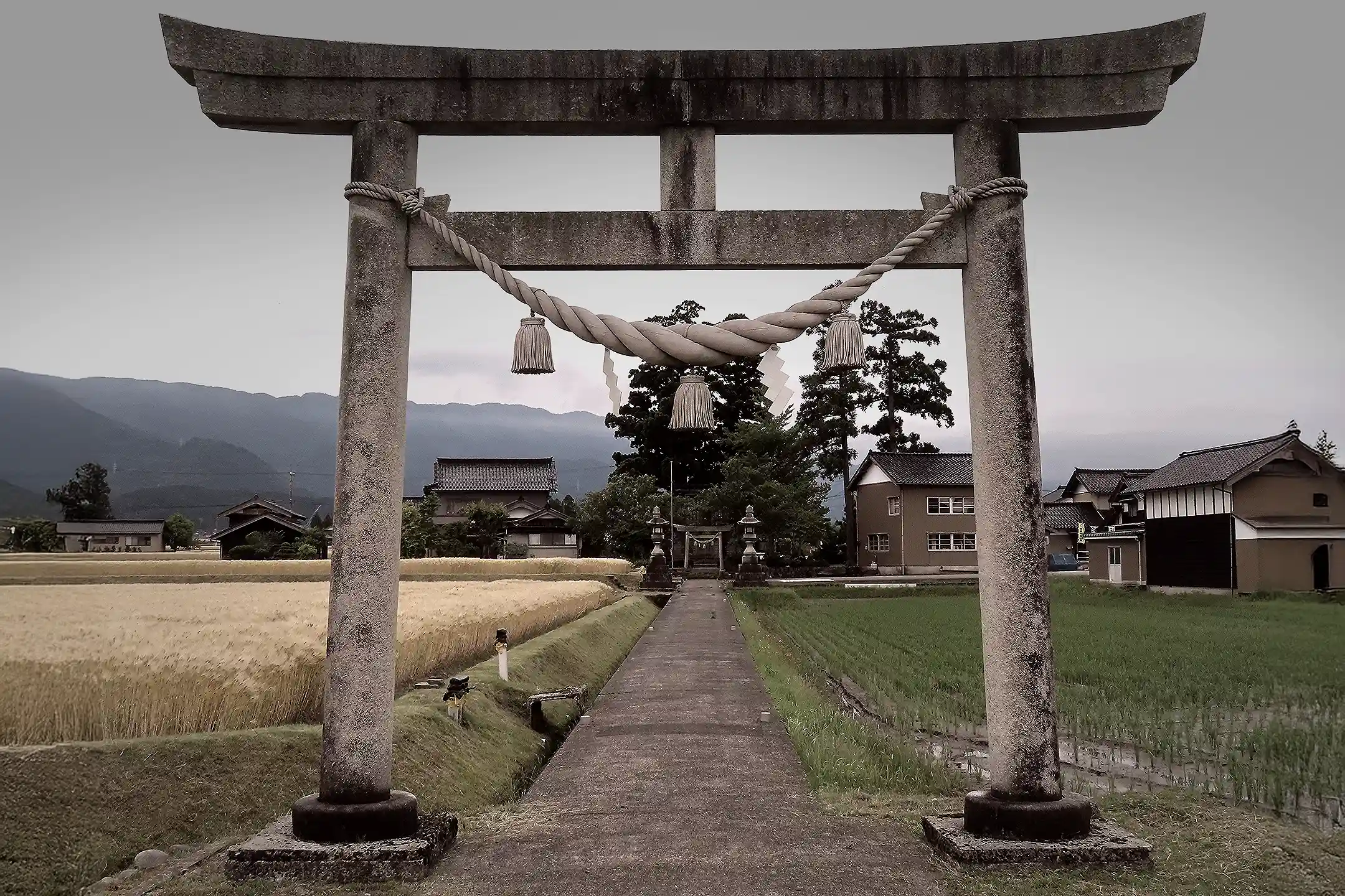 A plain torii gate on a country shrine approach