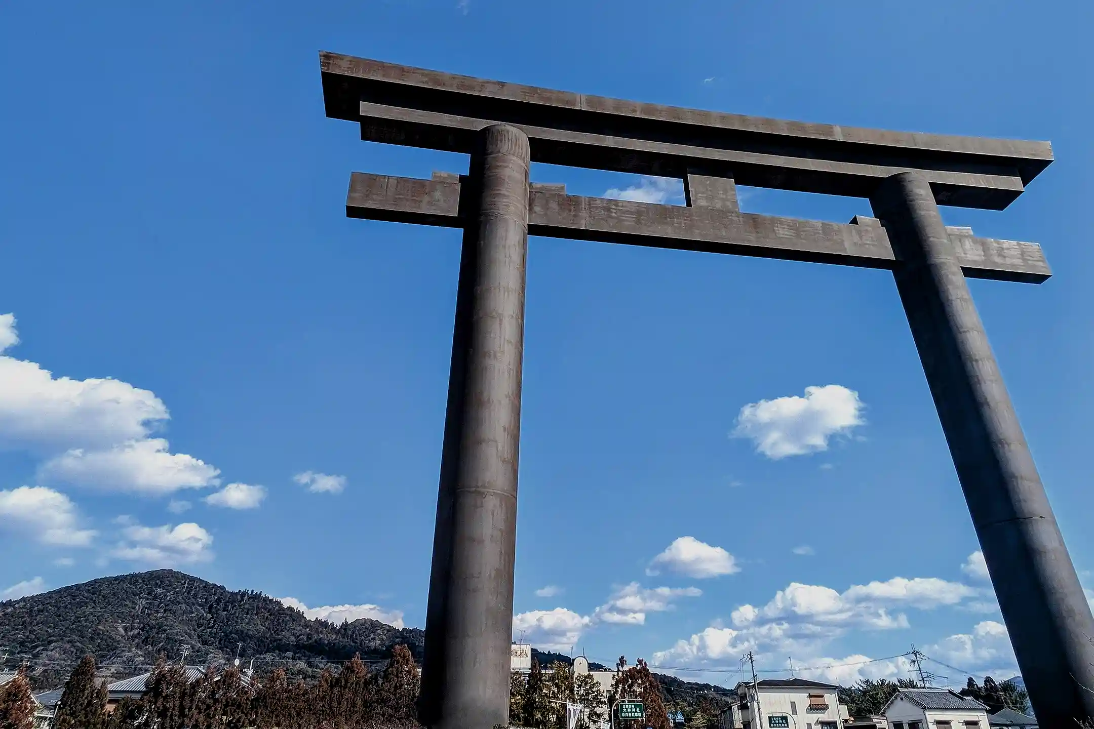 A large torii gate with mountains behind it, Nara Prefecture