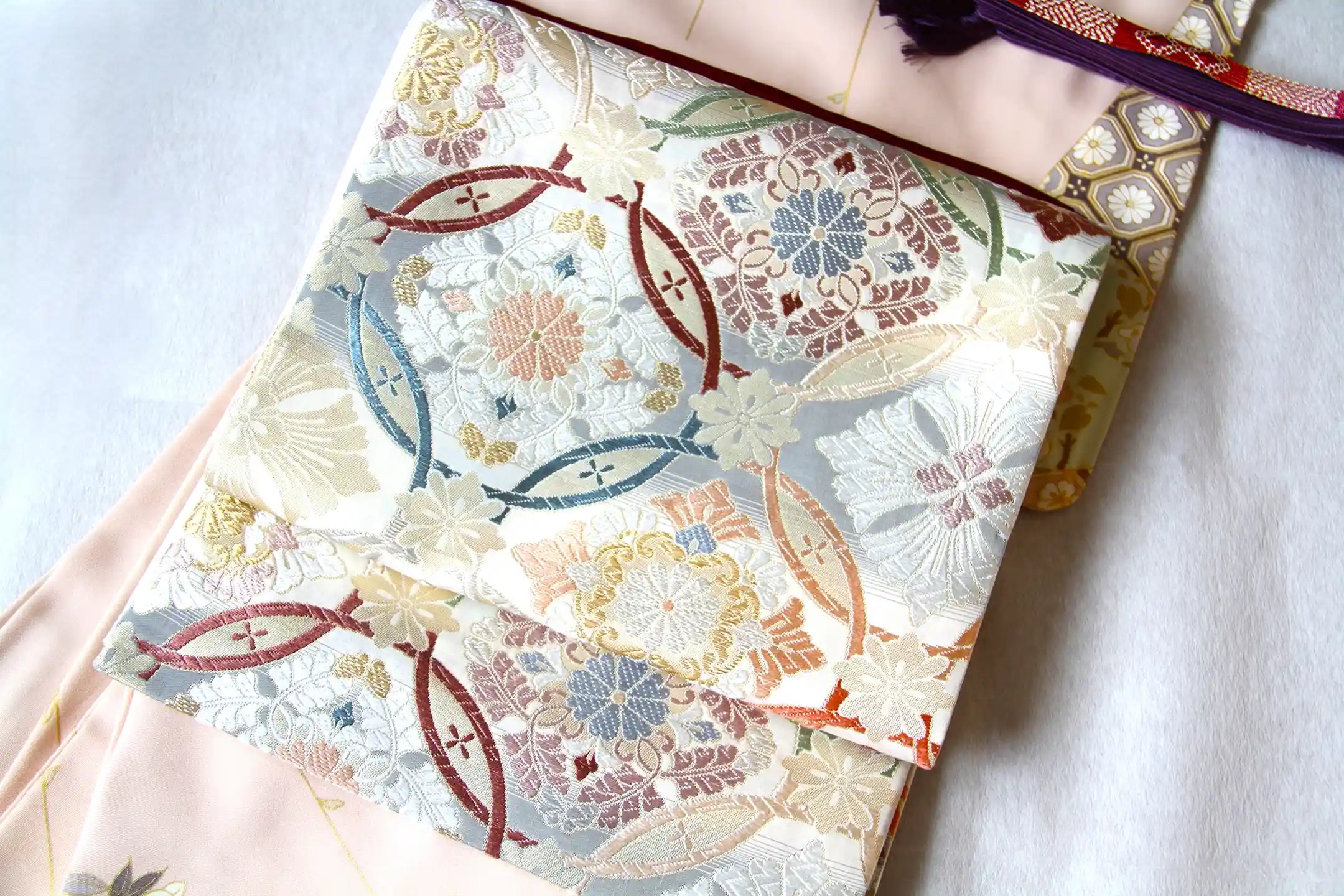 A woven kimono and sash